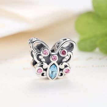 Ezüst pillangó charm kék kővel