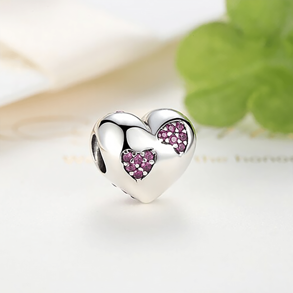 Ezüst szív charm pink kővel